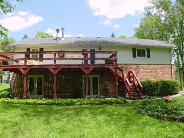 1156 South Hacker Road Brighton, MI 48114 - Photo 3 of 19 back of house