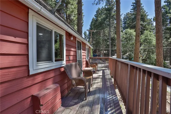 a view of balcony with trees