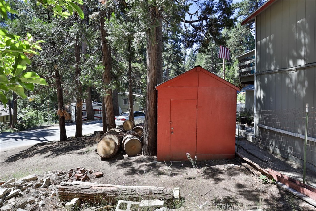 2548 Secret Drive Running Springs, CA 92382 - Photo 22 of 24 a front view of a house with garden