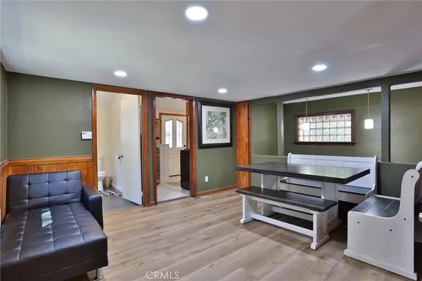 a lobby with furniture and window