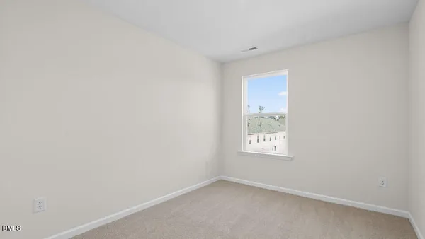 an empty room with window
