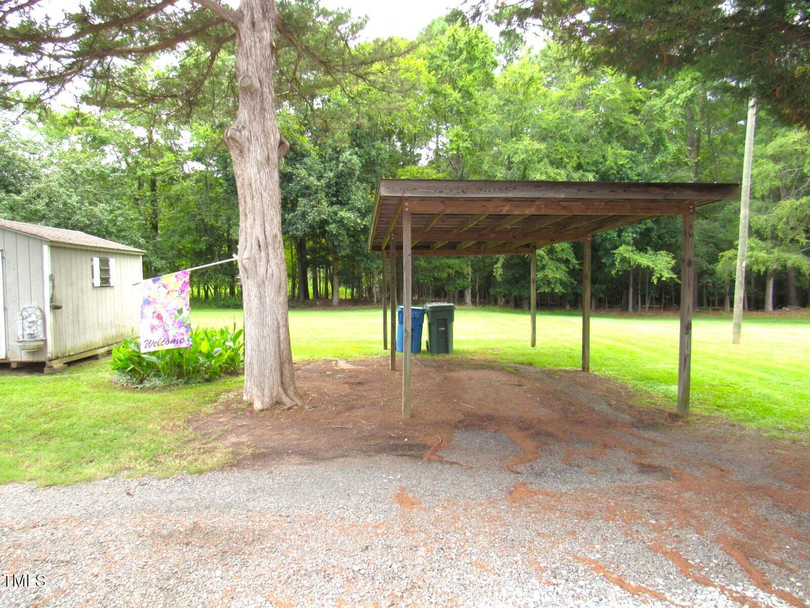 407 Chandler Road Durham, NC 27703 - Photo 23 of 31 Wood carport