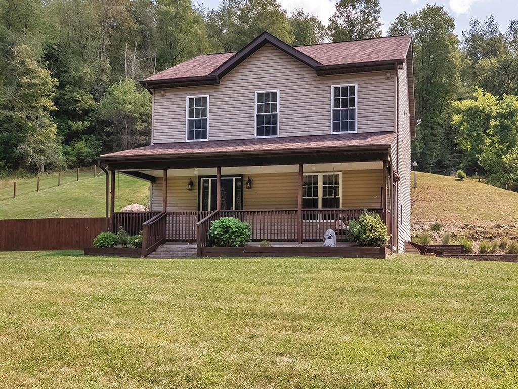 1928 Dime Road Vandergrift, PA 15690 - Photo 1 of 41 a front view of house with yard and green space