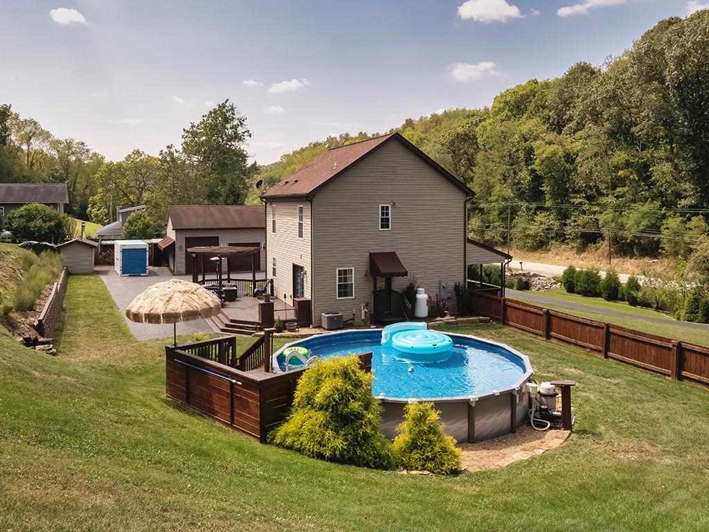 1928 Dime Road Vandergrift, PA 15690 - Photo 2 of 41 a view of a swimming pool with a patio