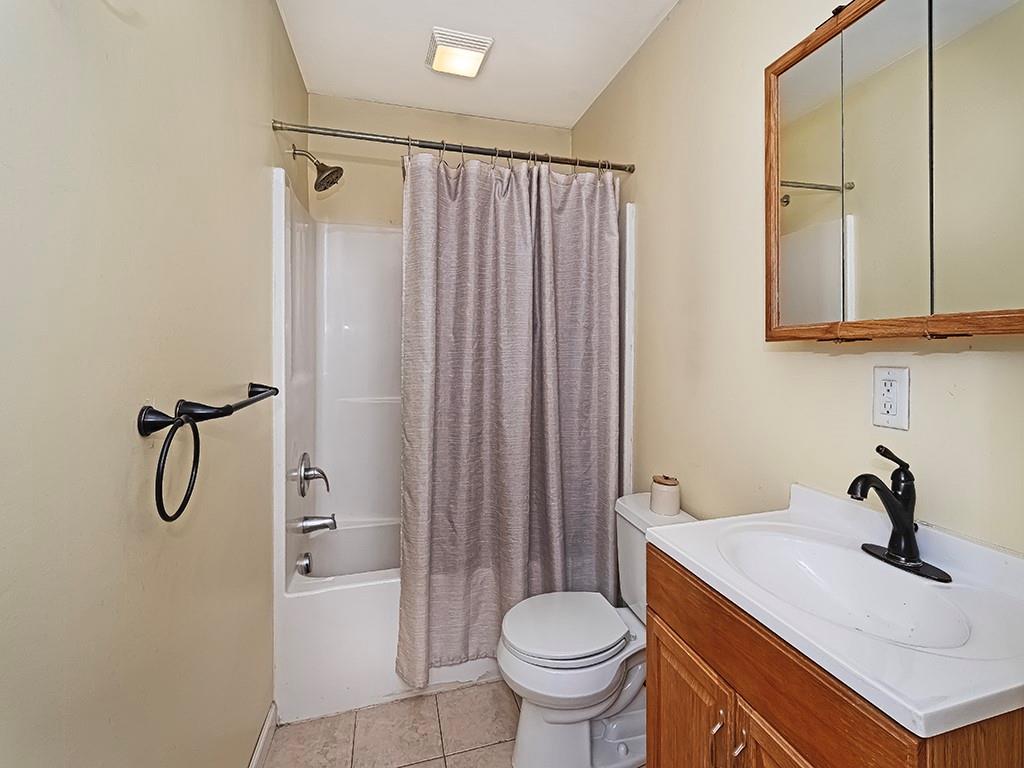 1928 Dime Road Vandergrift, PA 15690 - Photo 26 of 41 a bathroom with a sink a toilet and shower