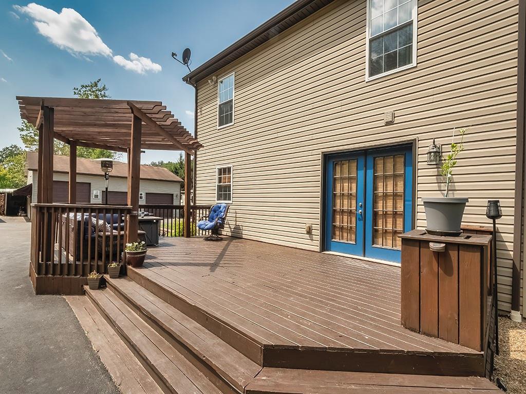 1928 Dime Road Vandergrift, PA 15690 - Photo 32 of 41 a view of a house with barbeque and wooden stairs