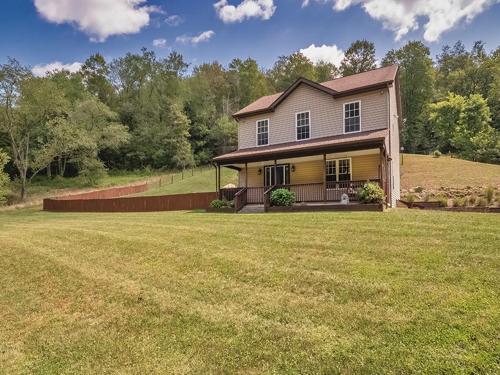 1928 Dime Road Vandergrift, PA 15690 - Photo 33 of 41 a house view with swimming pool and garden space