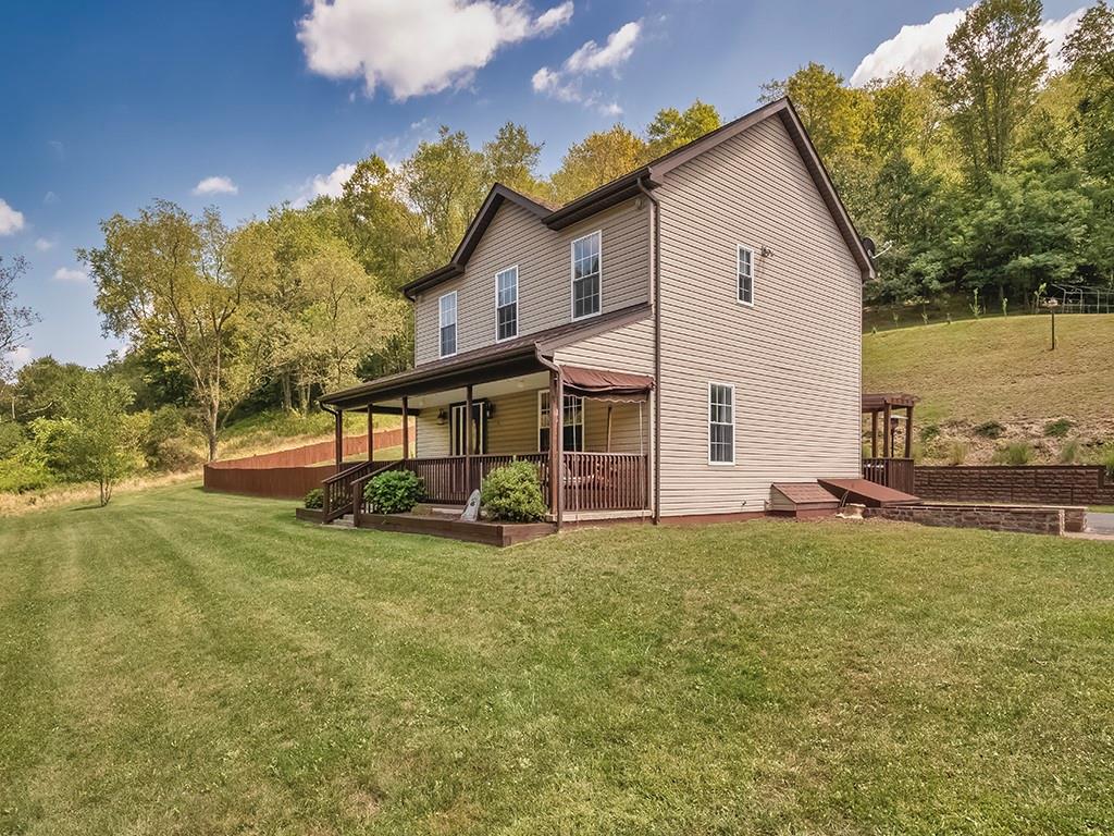 1928 Dime Road Vandergrift, PA 15690 - Photo 35 of 41 a view of a house with a yard and sitting area