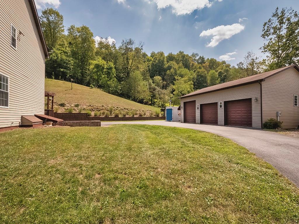 1928 Dime Road Vandergrift, PA 15690 - Photo 4 of 41 a view of a house with a yard