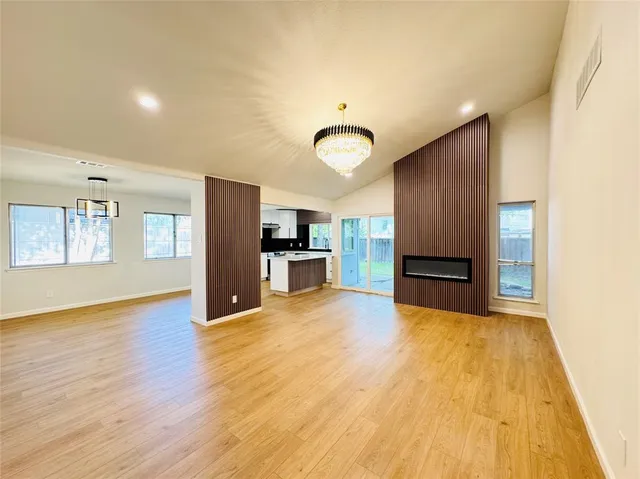 a view of kitchen with wooden floor