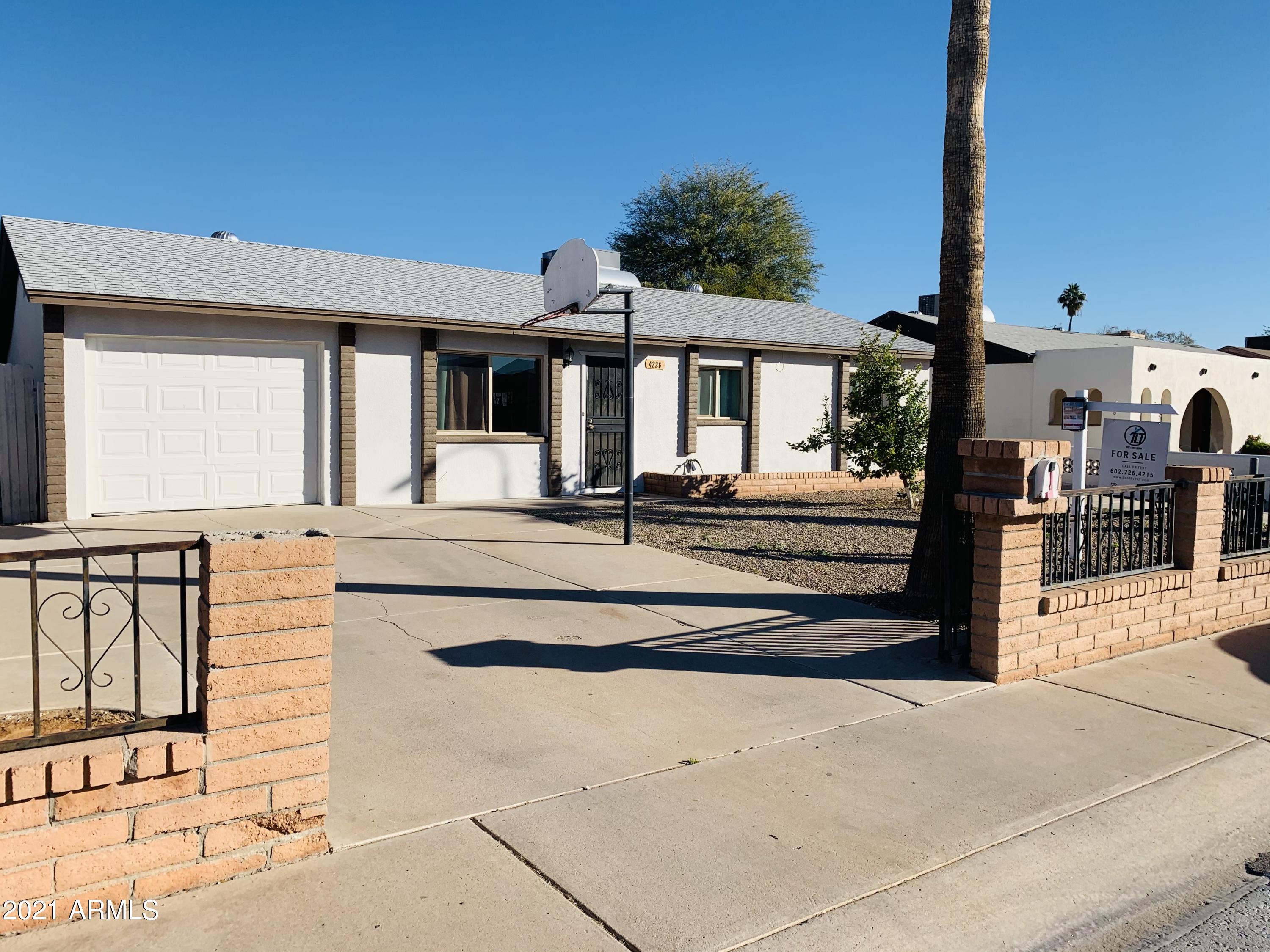 4228 West Alta Vista Road Phoenix, AZ 85041 - Photo 1 of 24 IMG_2789