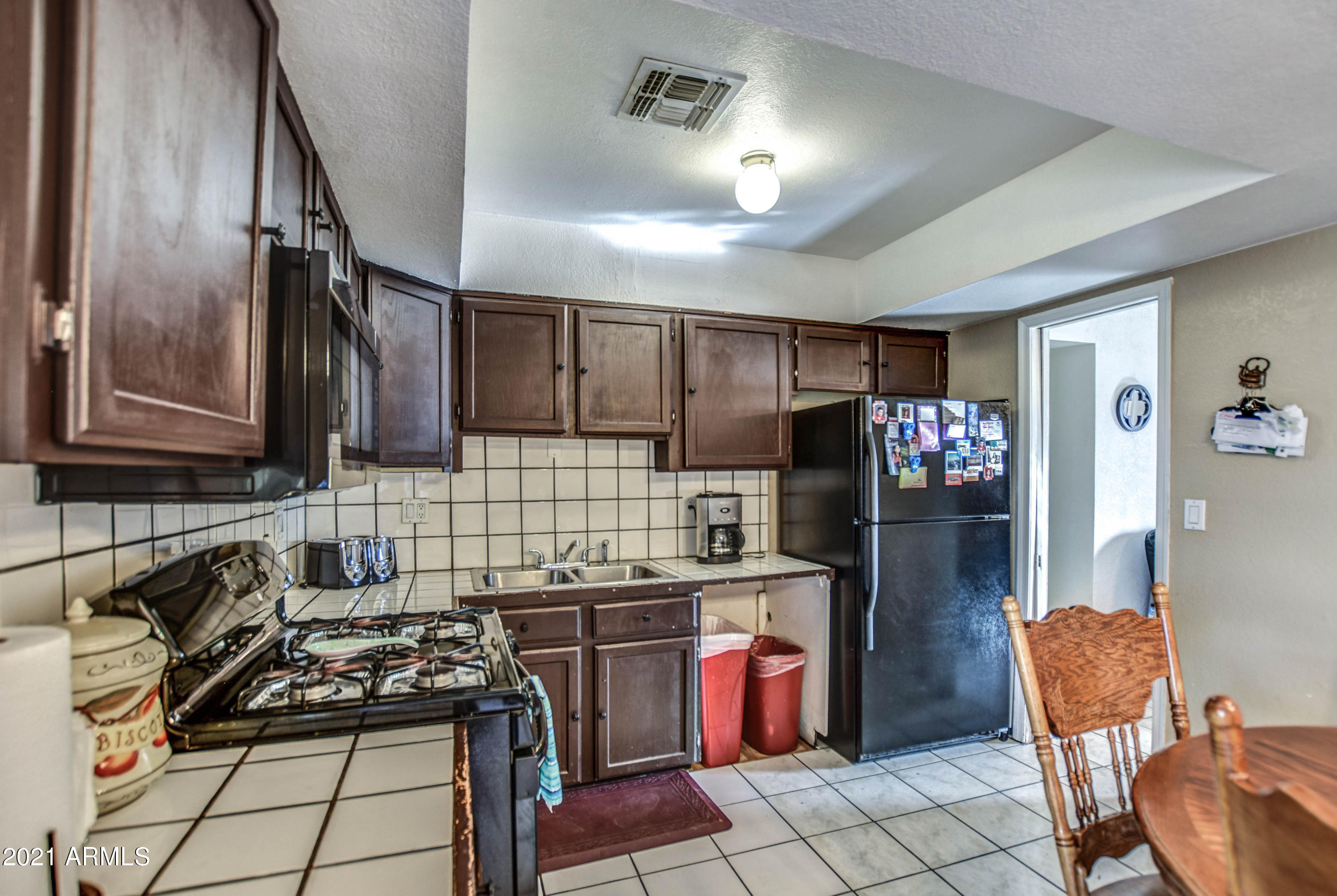 4228 West Alta Vista Road Phoenix, AZ 85041 - Photo 12 of 24 KITCHEN 5