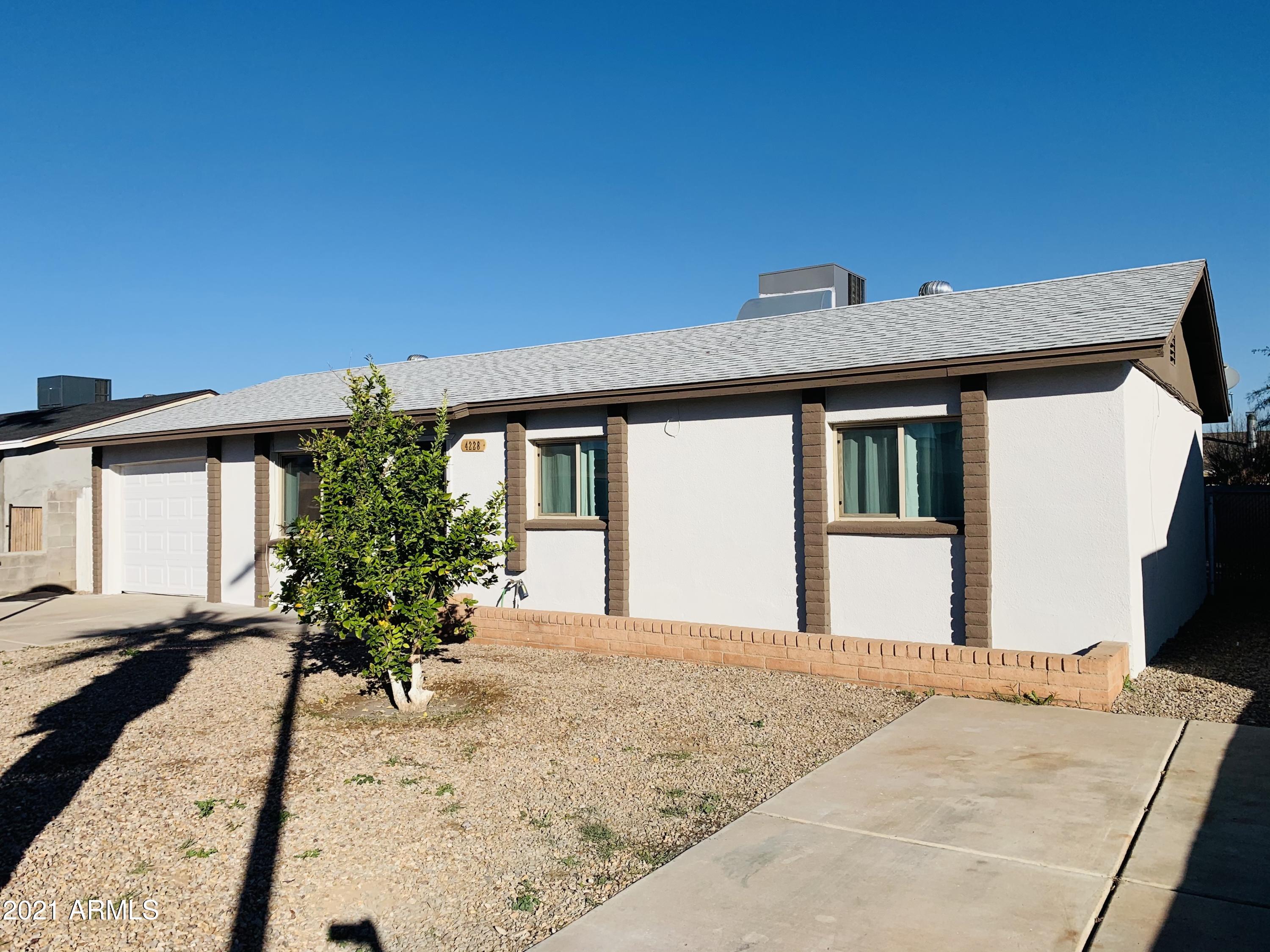 4228 West Alta Vista Road Phoenix, AZ 85041 - Photo 2 of 24 IMG_2786