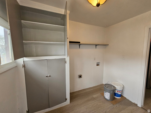 744 Royal Street Helper, UT 84526 - Photo 19 of 33 Laundry area featuring wood finished floors and hookup for a washing machine