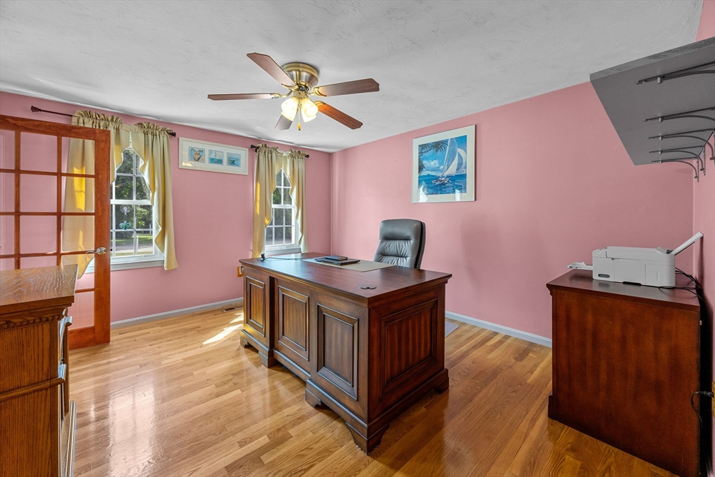 19 King Philip Path Mendon, MA 01756 - Photo 12 of 42 a kitchen with stainless steel appliances granite countertop a stove and a wooden floors