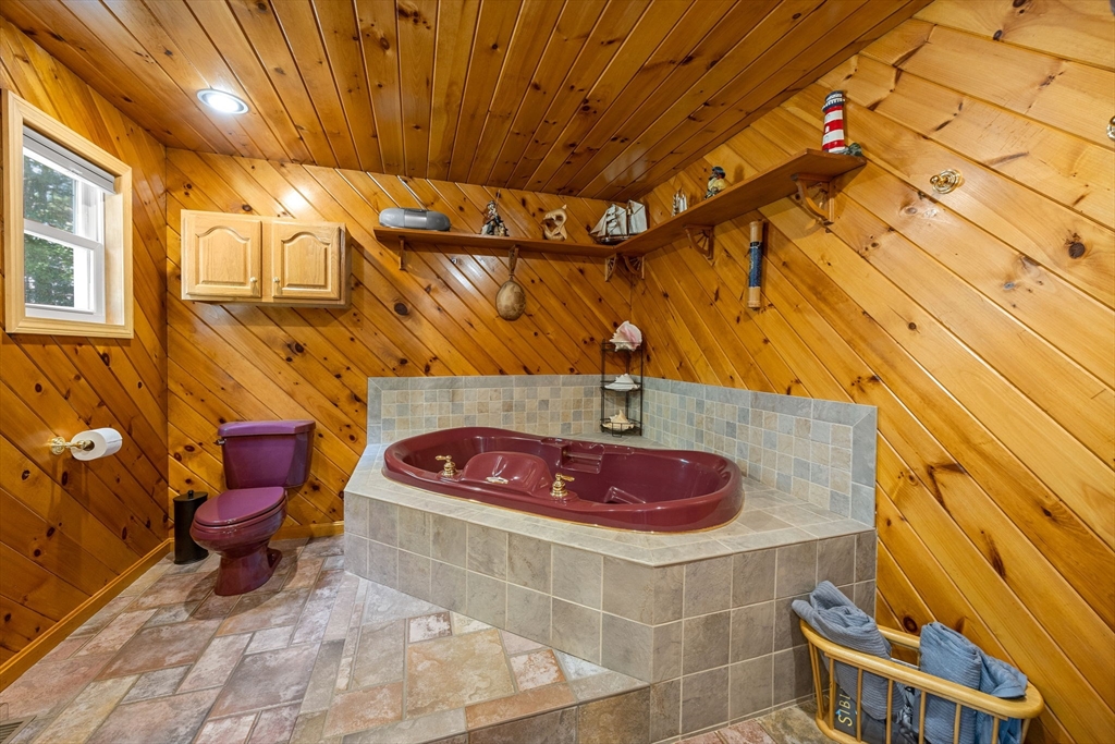 19 King Philip Path Mendon, MA 01756 - Photo 15 of 42 a bathroom with a sink and toilet