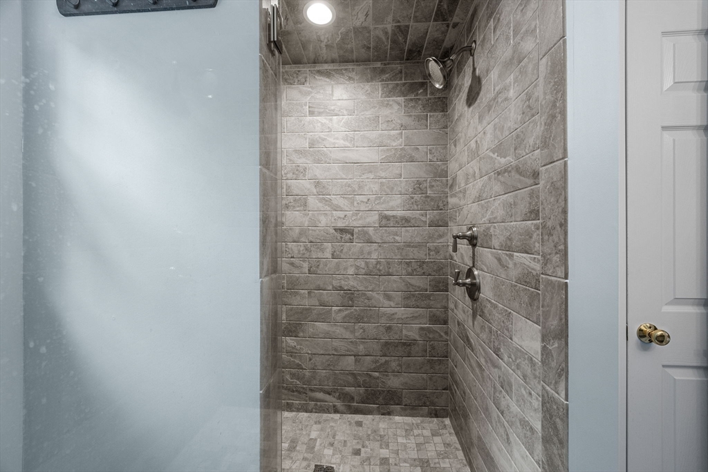 19 King Philip Path Mendon, MA 01756 - Photo 21 of 42 a bathroom with a shower