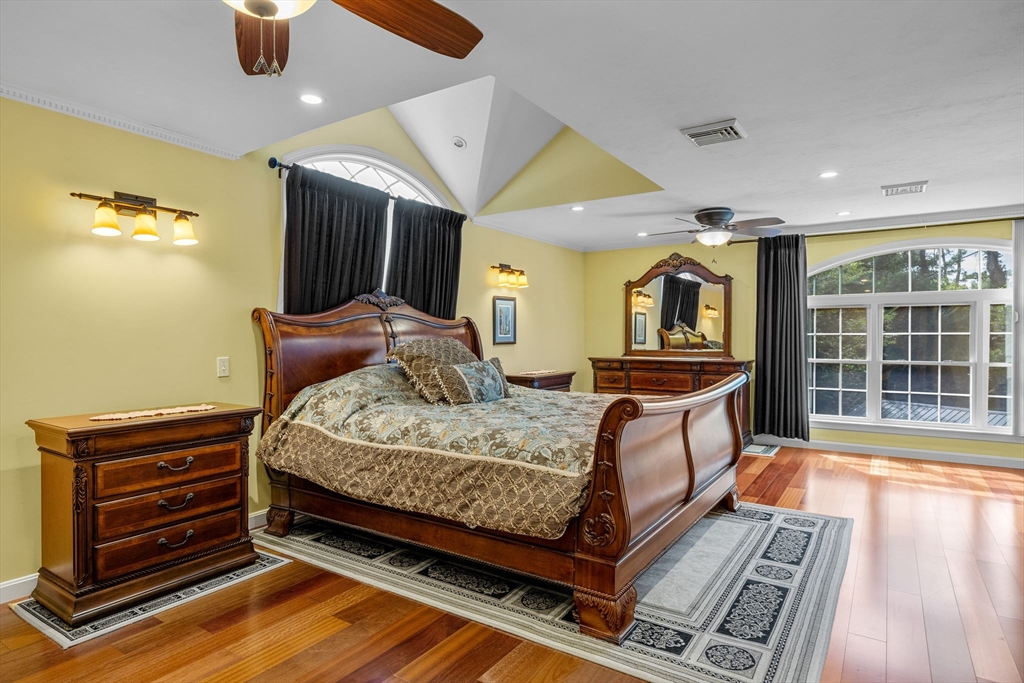 19 King Philip Path Mendon, MA 01756 - Photo 26 of 42 a bedroom with bed and wooden floor