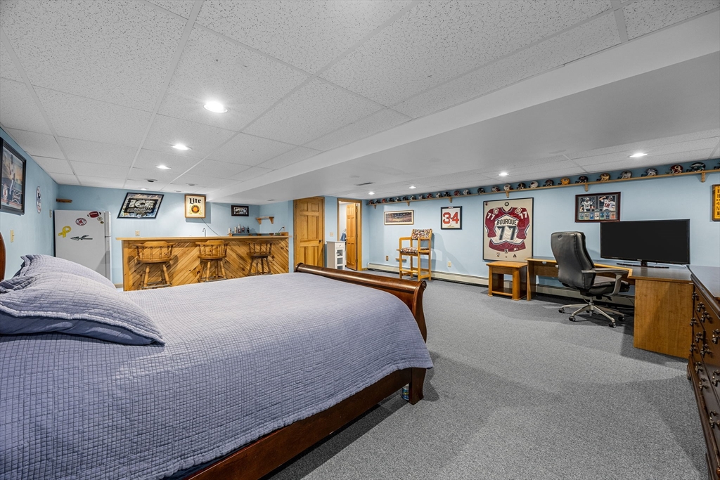 19 King Philip Path Mendon, MA 01756 - Photo 33 of 42 a bed room with a bed and furniture