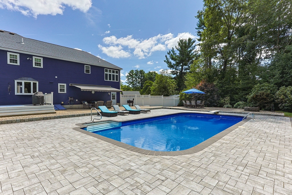 19 King Philip Path Mendon, MA 01756 - Photo 36 of 42 a view of swimming pool with outdoor seating
