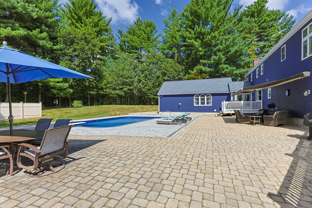 19 King Philip Path Mendon, MA 01756 - Photo 38 of 42 a house view with a sitting space and garden