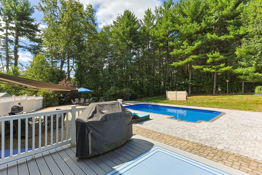 19 King Philip Path Mendon, MA 01756 - Photo 40 of 42 a view of a swimming pool with a couches