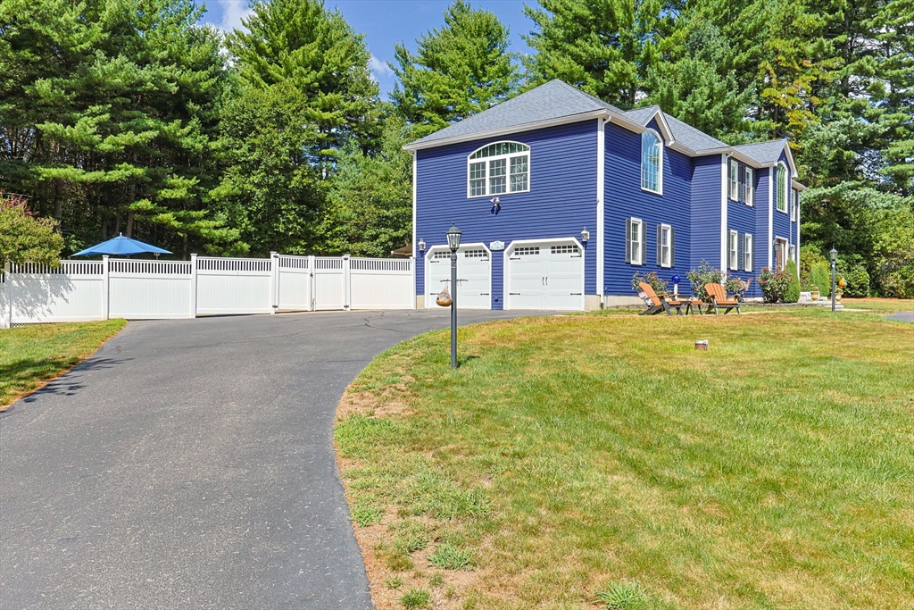 19 King Philip Path Mendon, MA 01756 - Photo 41 of 42 a view of a house with a yard and tree s
