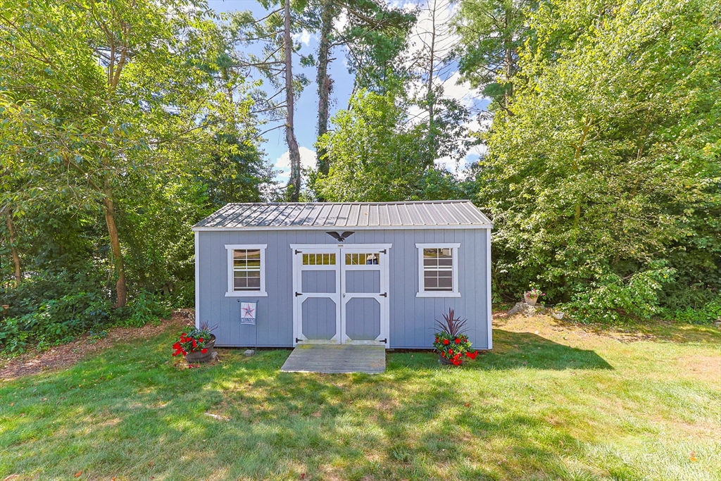 19 King Philip Path Mendon, MA 01756 - Photo 42 of 42 a view of a house with a yard