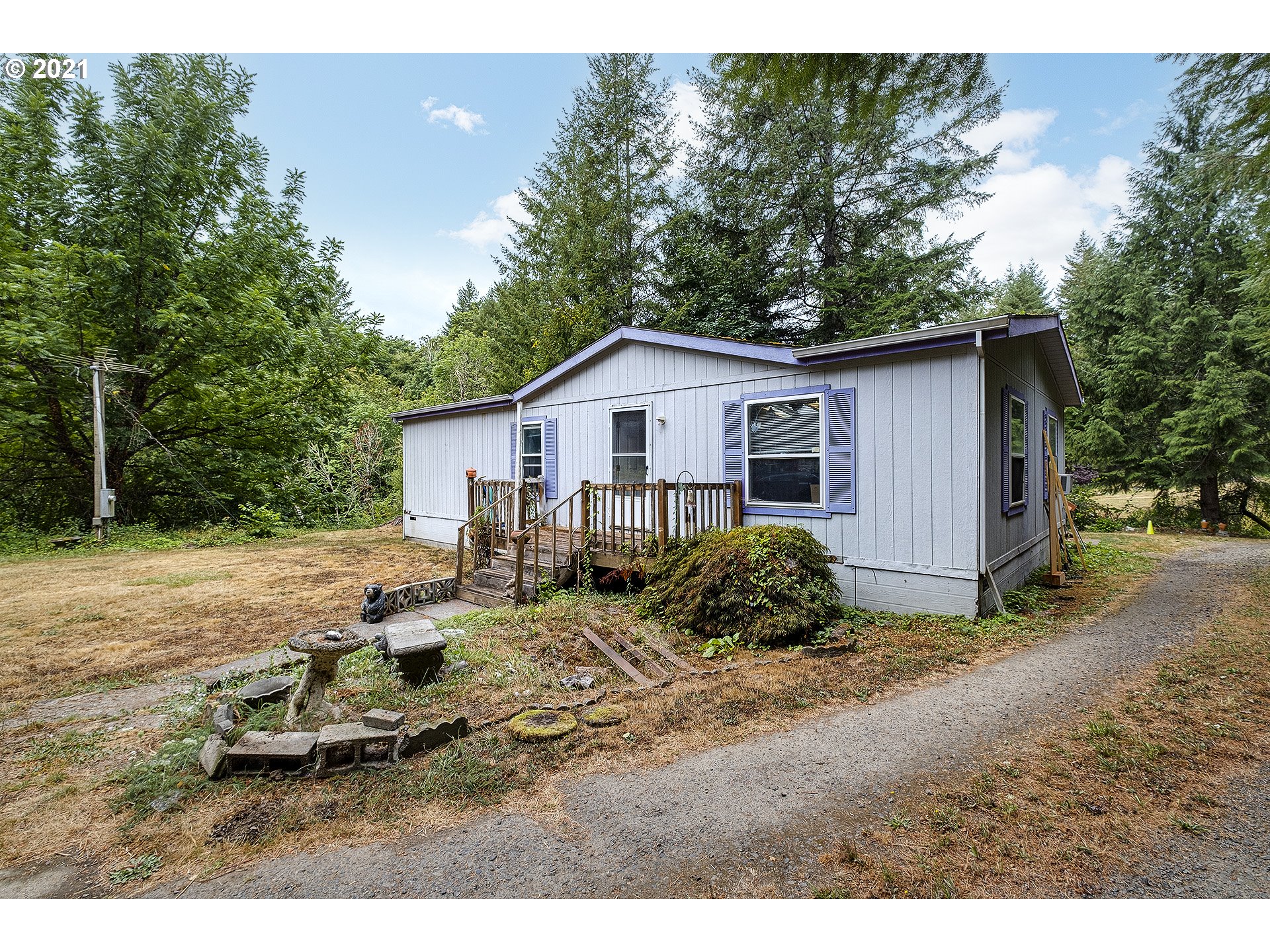 49213 Southwest Patton Valley Road Gaston, OR 97119 - Photo 3 of 32 a view of backyard of house with outdoor seating and yard