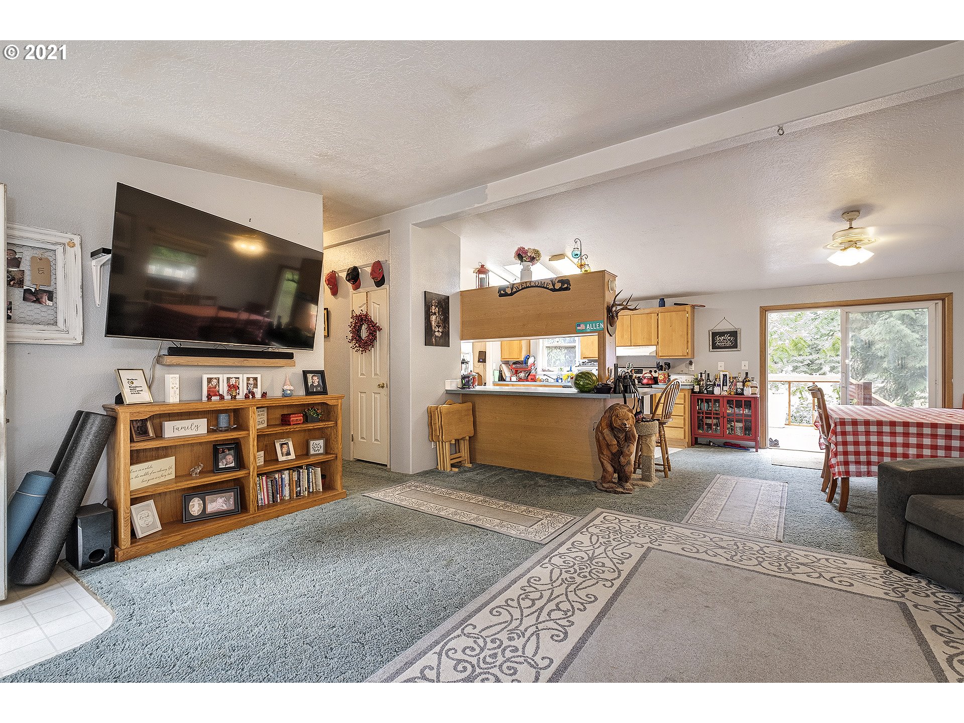 49213 Southwest Patton Valley Road Gaston, OR 97119 - Photo 7 of 32 a living room with furniture and a flat screen tv