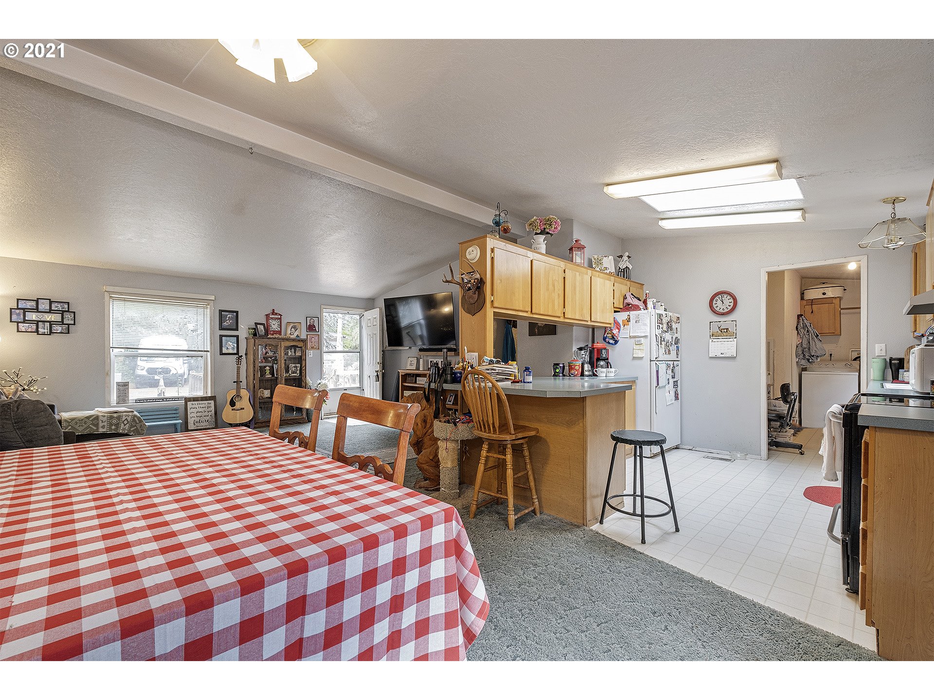 49213 Southwest Patton Valley Road Gaston, OR 97119 - Photo 10 of 32 a bedroom with a bed a table and chair