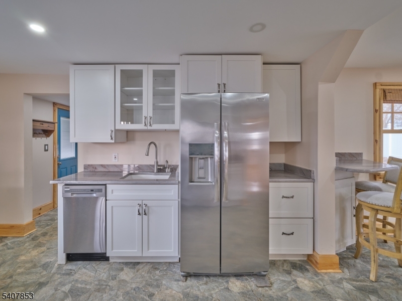 1387 Monmouth Road Eastampton, NJ 08060 - Photo 11 of 35 a kitchen with stainless steel appliances cabinets and a counter top space