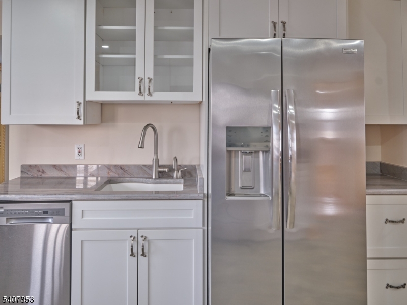 1387 Monmouth Road Eastampton, NJ 08060 - Photo 12 of 35 a kitchen with stainless steel appliances granite countertop a refrigerator and a sink