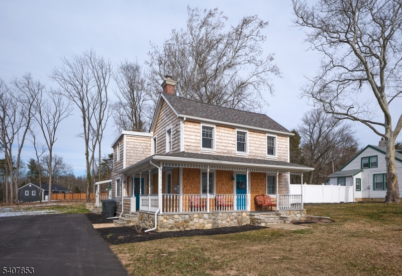 1387 Monmouth Road Eastampton, NJ 08060 - Photo 2 of 35 a front view of a house with garden