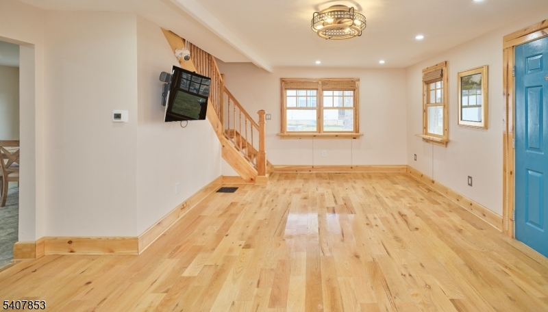 1387 Monmouth Road Eastampton, NJ 08060 - Photo 27 of 35 a view of a bedroom with wooden floor and windows