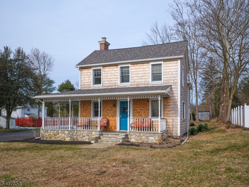 1387 Monmouth Road Eastampton, NJ 08060 - Photo 4 of 35 a front view of a house with a garden