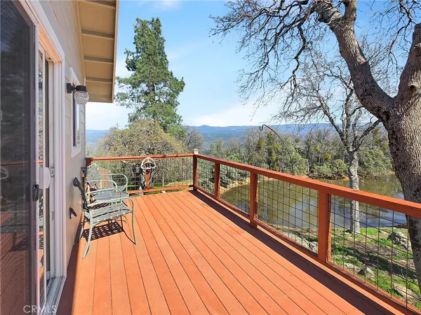 a view of balcony with furniture