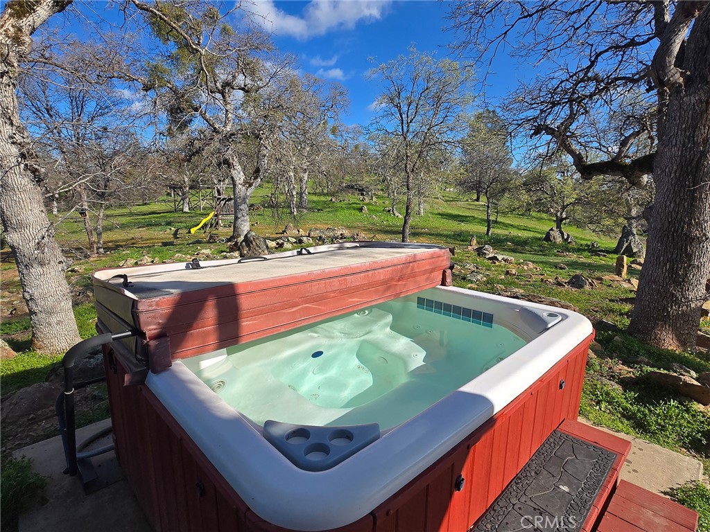 6097 Sherlock Road Midpines, CA 95345 - Photo 26 of 37 a view of a chairs in a backyard