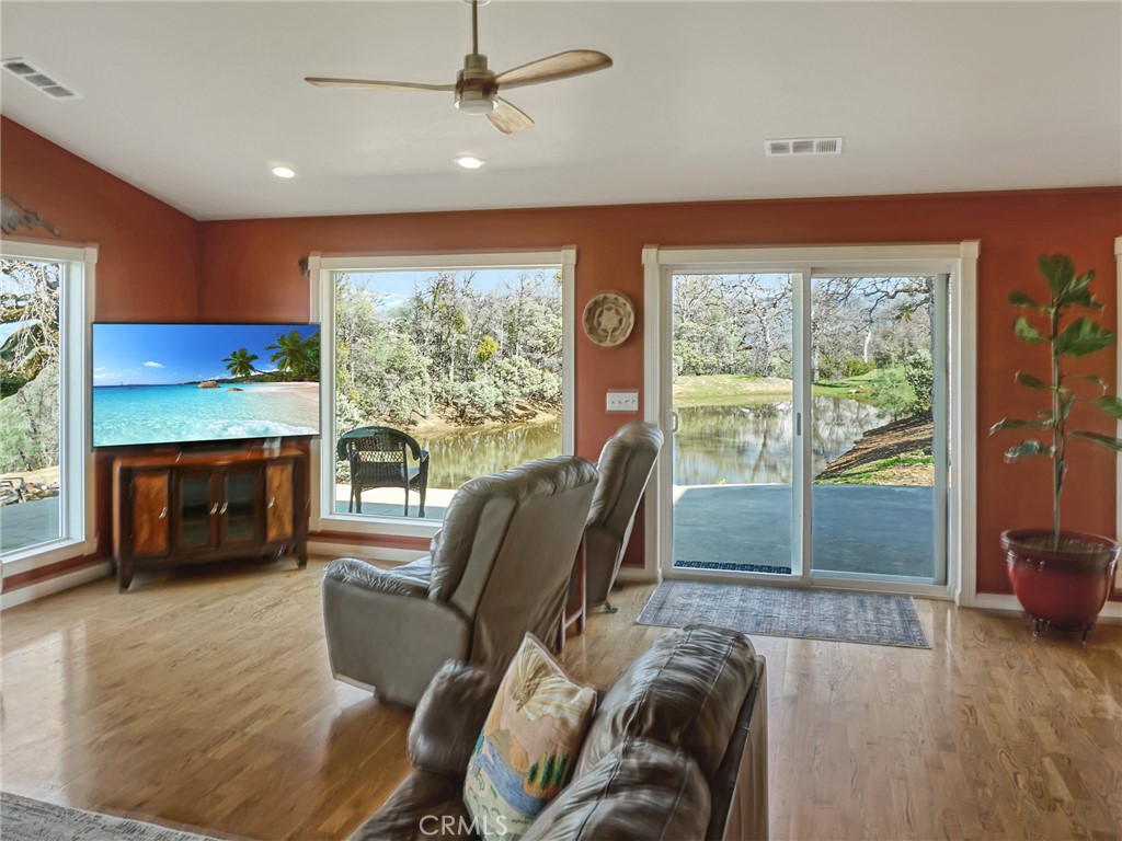 6097 Sherlock Road Midpines, CA 95345 - Photo 7 of 37 a living room with furniture and a fireplace