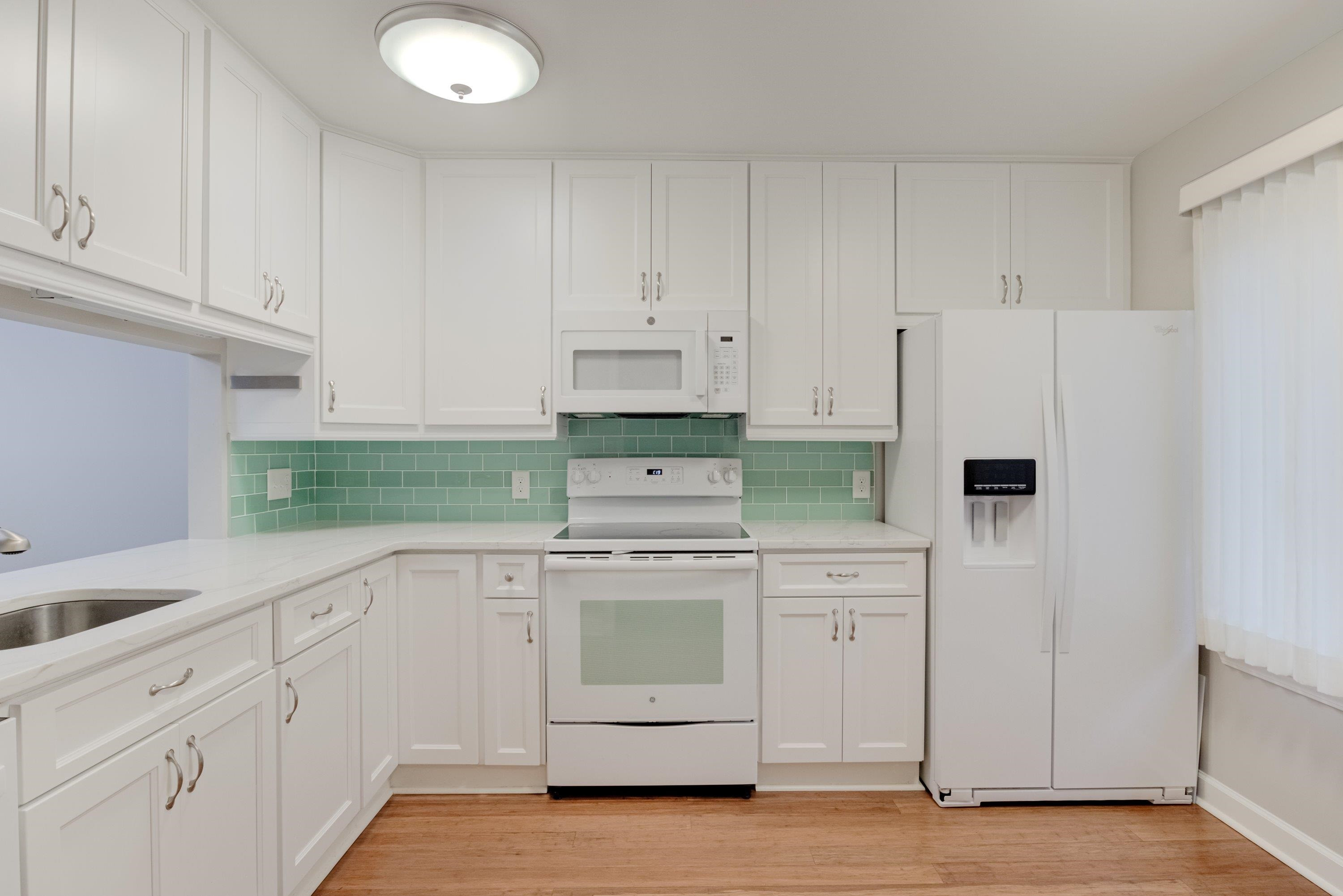 821 Green Ridge Drive Raleigh, NC 27609 - Photo 6 of 38 Subway tile backsplash