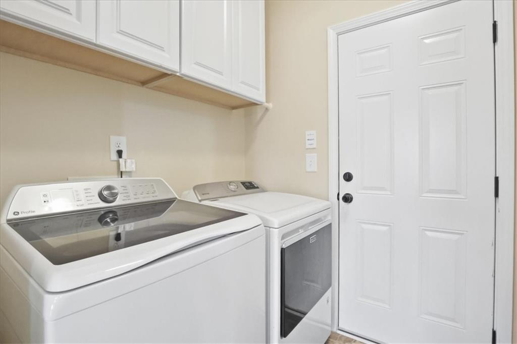 525 Widgeon Way Jefferson, GA 30549 - Photo 25 of 65 a utility room with dryer and washer