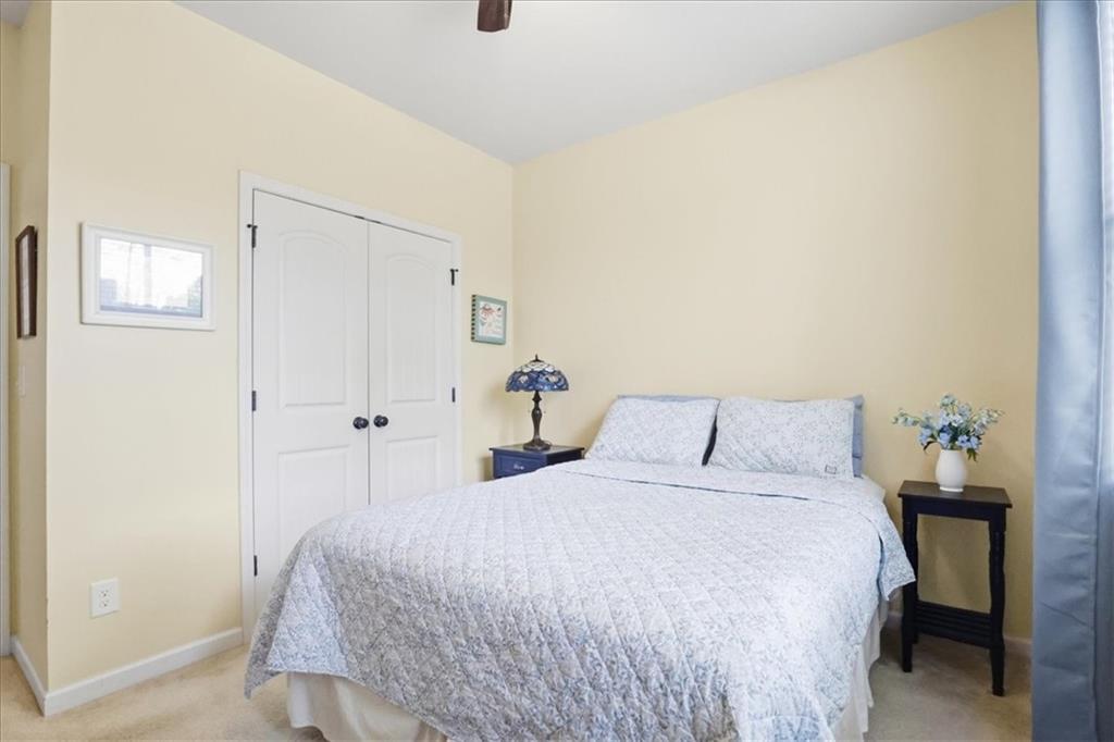 525 Widgeon Way Jefferson, GA 30549 - Photo 29 of 65 a bedroom with a bed and a window
