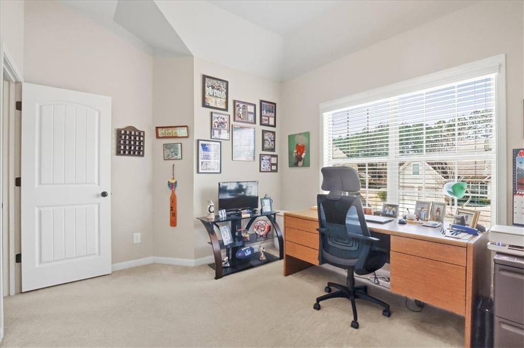 525 Widgeon Way Jefferson, GA 30549 - Photo 33 of 65 a view of a livingroom with workspace and a window