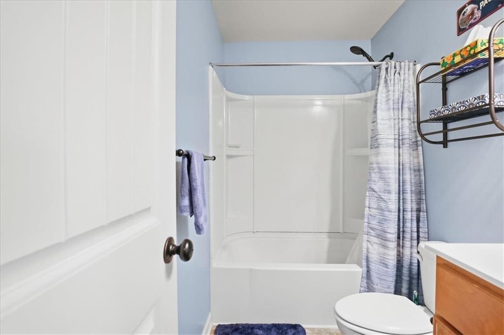 525 Widgeon Way Jefferson, GA 30549 - Photo 38 of 65 a bathroom with a toilet and shower