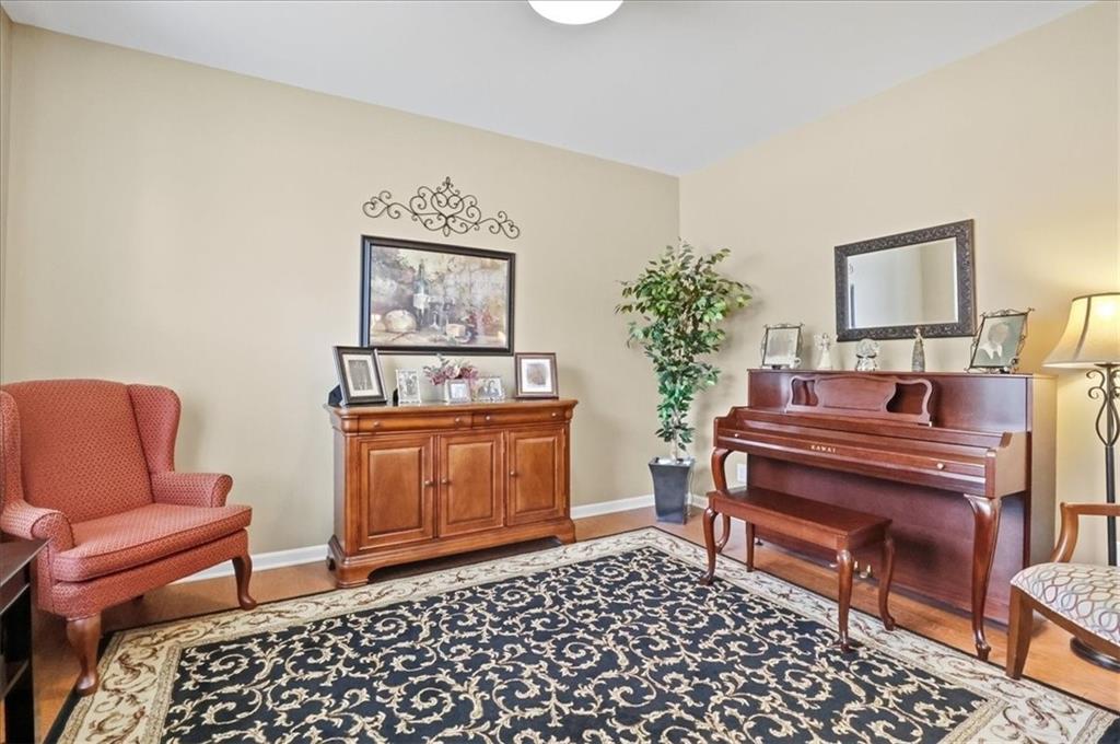 525 Widgeon Way Jefferson, GA 30549 - Photo 8 of 65 a living room with furniture and a piano