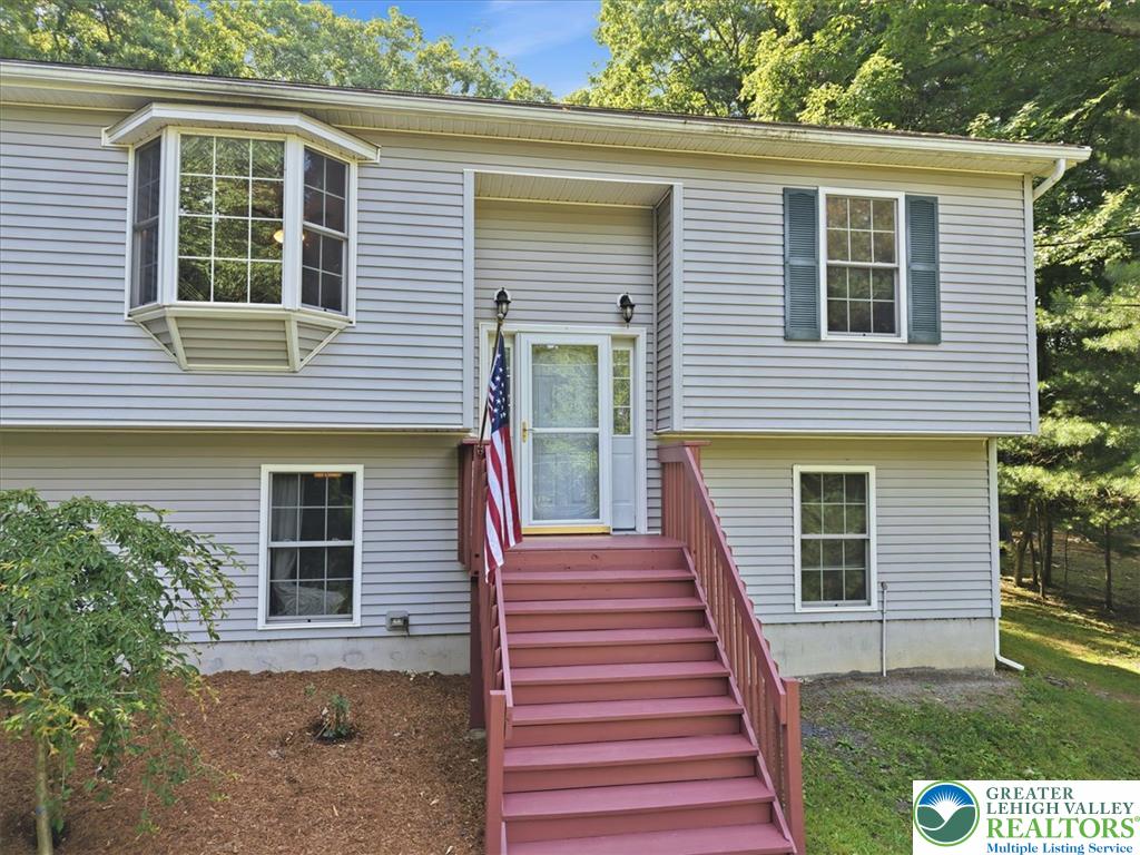 128 Chestnut Street Dingmans Ferry, PA 18328 - Photo 3 of 43 A welcoming front entrance.