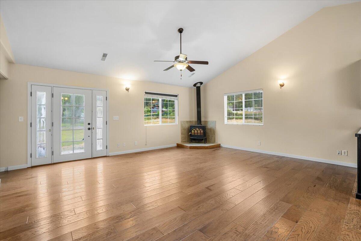 1196 Freshwater Road Eureka, CA 95503 - Photo 11 of 34 a view of an empty room with wooden floor and a window