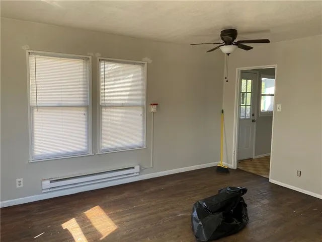 a room with window and a table