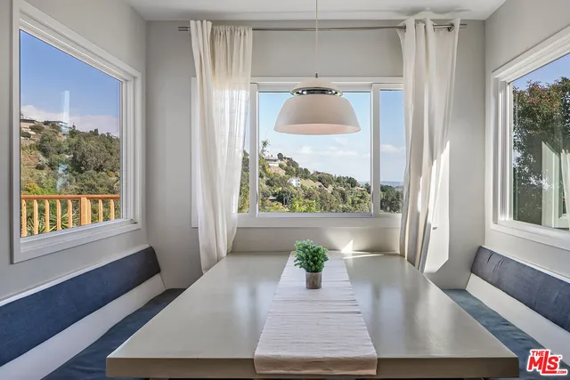 a view of a living room and a window