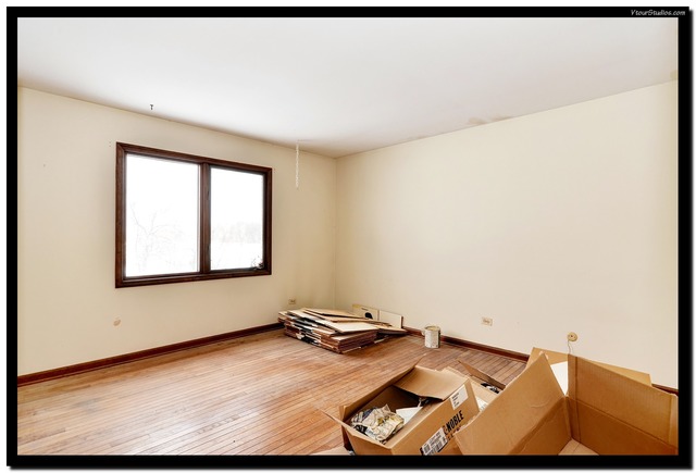 38W709 Seavey Road Batavia, IL 60510 - Photo 12 of 21 a view of a room with wooden floor and window